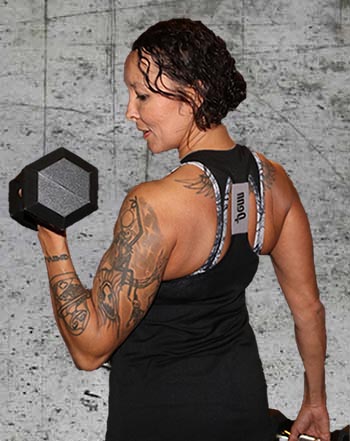 Lady with back turned holding dumbbell